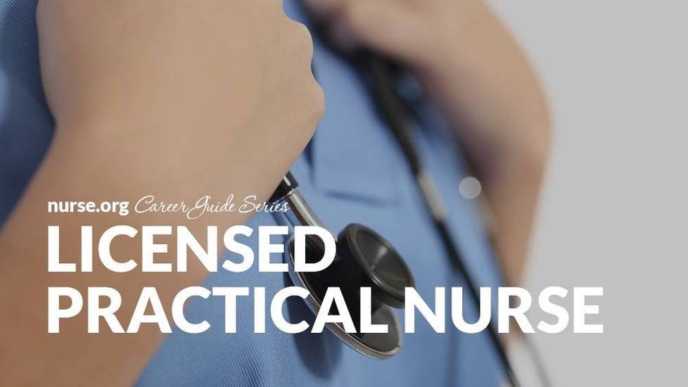 Confident nurse wearing scrubs holding onto stethoscope