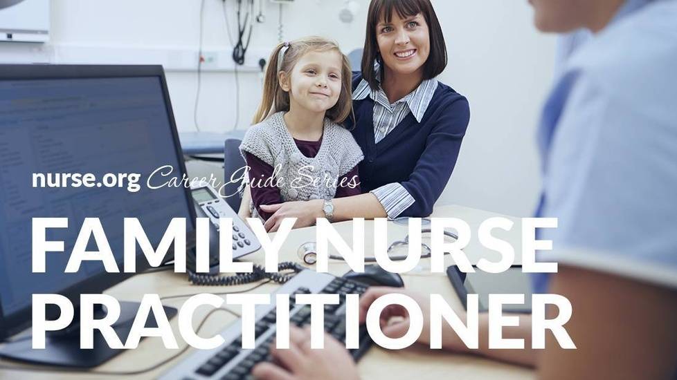 Family nurse practitioner taking notes on computer with mother and daughter in background