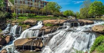 Park view with waterfalls in river in South Carolina